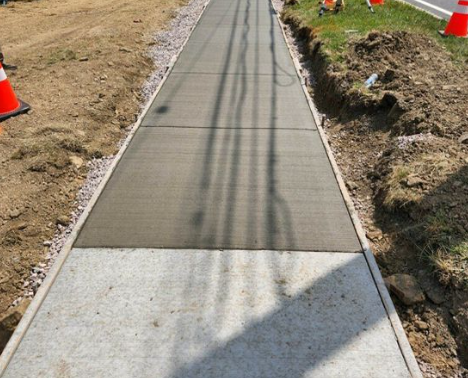 Damaged, cracked concrete surface before repair